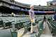Plenty of good seats remained available as Oakland Athletics’ fan Helge Mortensen stood for the national anthem at his seat behind the A’s dugout before a game at the Coliseum on April 20.
