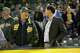 OAKLAND, CA - APRIL 21: Managing Partner John Fisher and President David Kaval of the Oakland Athletics talk in the stands during the game against the Seattle Mariners at the Oakland Alameda Coliseum on April 21, 2017 in Oakland, California. The Athletics defeated the Mariners 3-1. (Photo by Michael Zagaris/Oakland Athletics/Getty Images)