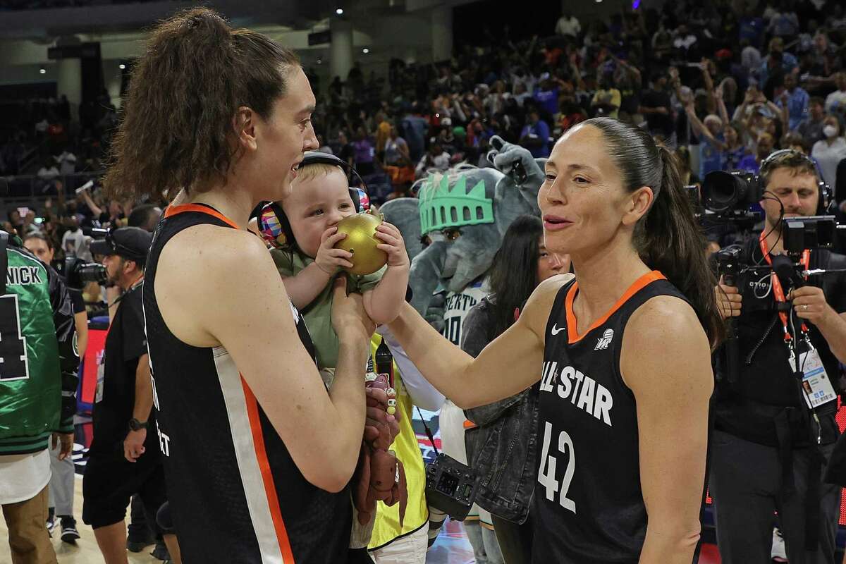 Breanna Stewart, left, and Sue Bird of Team Stewart speak after the WNBA All-Star Game Sunday at the Wintrust Arena in Chicago.