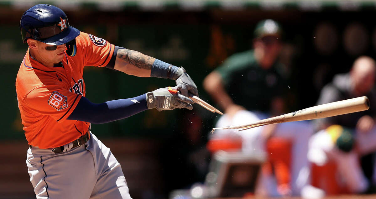 Korey Lee #38 of the Houston Astros hits a broken bat single that scored a run in the fifth inning against the Oakland Athletics at RingCentral Coliseum on July 10, 2022 in Oakland, California. (Photo by Ezra Shaw/Getty Images)