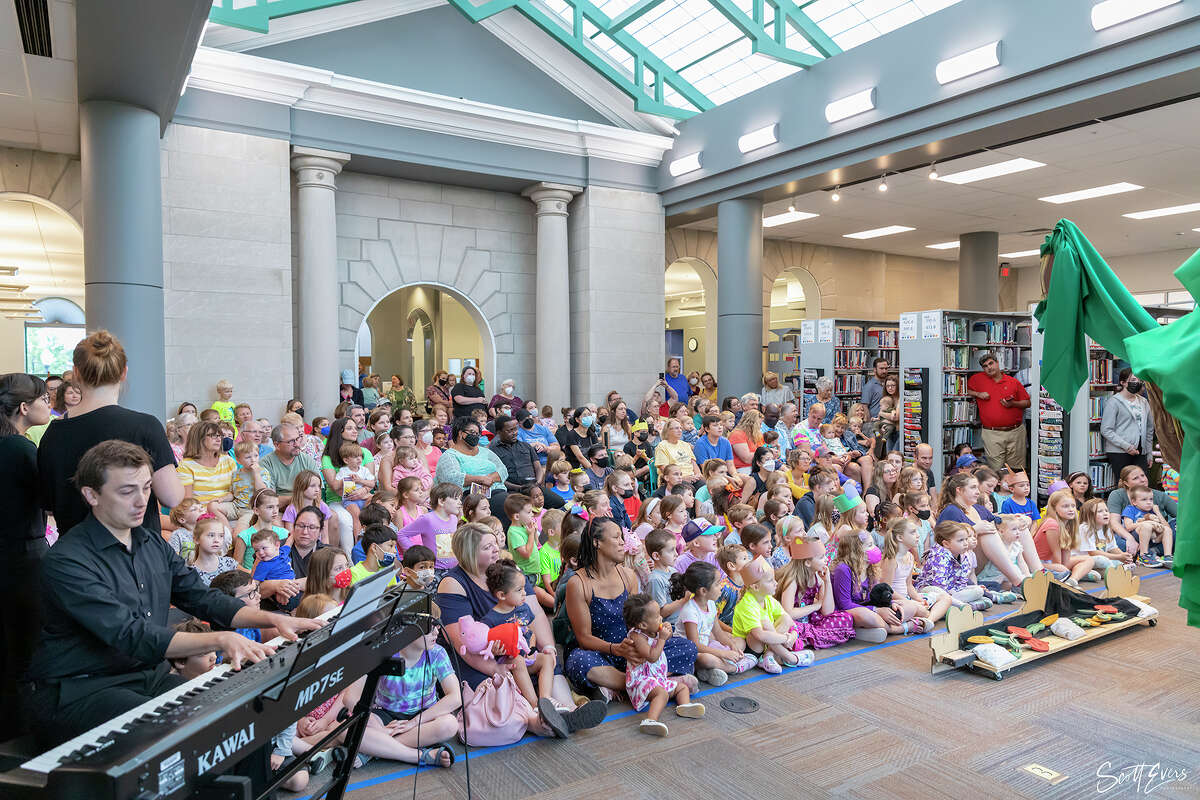 Pianist and music director Joseph Welch, a Bunker Hill native, left foreground, plays for Opera Edwardsville's (OE) Opera for Kids "Goldilocks and the Three Singing Bears" Saturday at the Edwardsville Public Library. OE enjoyed another huge turnout for its Opera for Kids, now in its fourth year. The cast represented artists from all over the Metro East, including Alton, Collinsville, Bunker Hill, Edwardsville, Glen Carbon, and Belleville, as well as St. Louis.