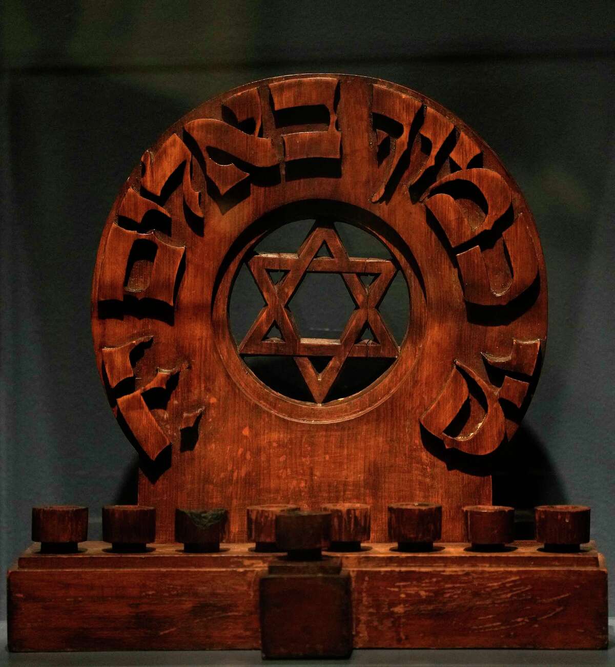 A Hanukkah lamp with the Hebrew inscription, “Who is like you, O Lord, among the celestials?” that was created during the Holocaust is on exhibit in the "Beauty and Ritual: Judaica" at the Museum of Fine Arts, Houston.