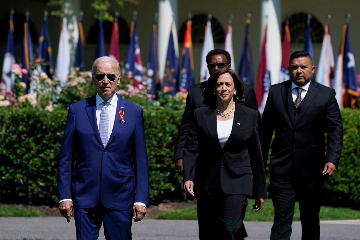 President Joe Biden and Vice President Kamala Harris, arrive for an event to celebrate the passage of the "Bipartisan Safer Communities Act," a law meant to reduce gun violence, Monday, July 11, 2022, on the South Lawn of the White House in Washington. Harris will headline the Democratic party's annual Johnson-Jordan Reception — named for President Lyndon B. Johnson and U.S. Rep. Barbara Jordan — on Oct. 8.
