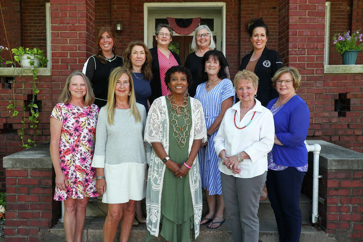 Pictured at the former Alton Women’s Home are, from left, front row vice president Debby Edelman, corresponding secretary Marlene Lewis, president Stephanie Elliott, treasurer Sharon Roberts and recording secretary Jody Basola. Second row from left are board members Christy Schaper, Martha Morse, Carol Fletcher, Julie Tracy, Donna Fisher and Cara Paschal. Not pictured are Mary Beiser, Erin Bickel, Mary Boulds, Katie Ealey, Trish Holmes, Natalie Merrill and Martha Schultz.
