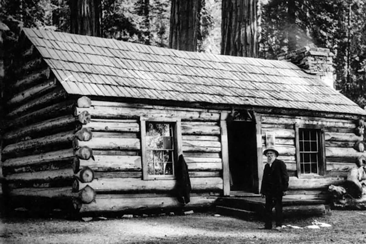 Galen Clark, seen here in front of his Mariposa Grove cabin in 1904, was Yosemite National Park's first "guardian." He played a major role in the early days of the park after President Abraham Lincoln signed legislation protecting Yosemite Valley and Mariposa Grove.