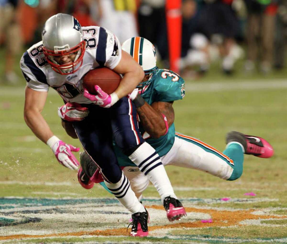 New England Patriots Wes Welker picks up some of his 37 return