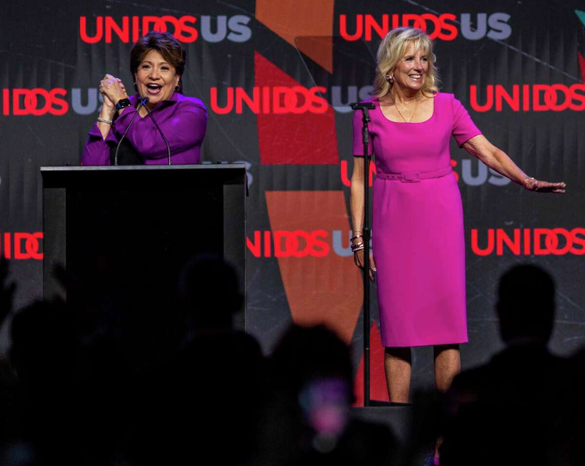 First Lady Dr. Jill Biden, right, is introduced Monday, July 11, 2022 at the Latinx IncluXion luncheon of the UnidosUS annual conference at the Grand Hyatt hotel in downtown San Antonio by UnidosUS president Janet Murguia. UnidosUS, formerly the National Council of La Raza, is the largest Latino civil rights organization in the United States, according to its website.