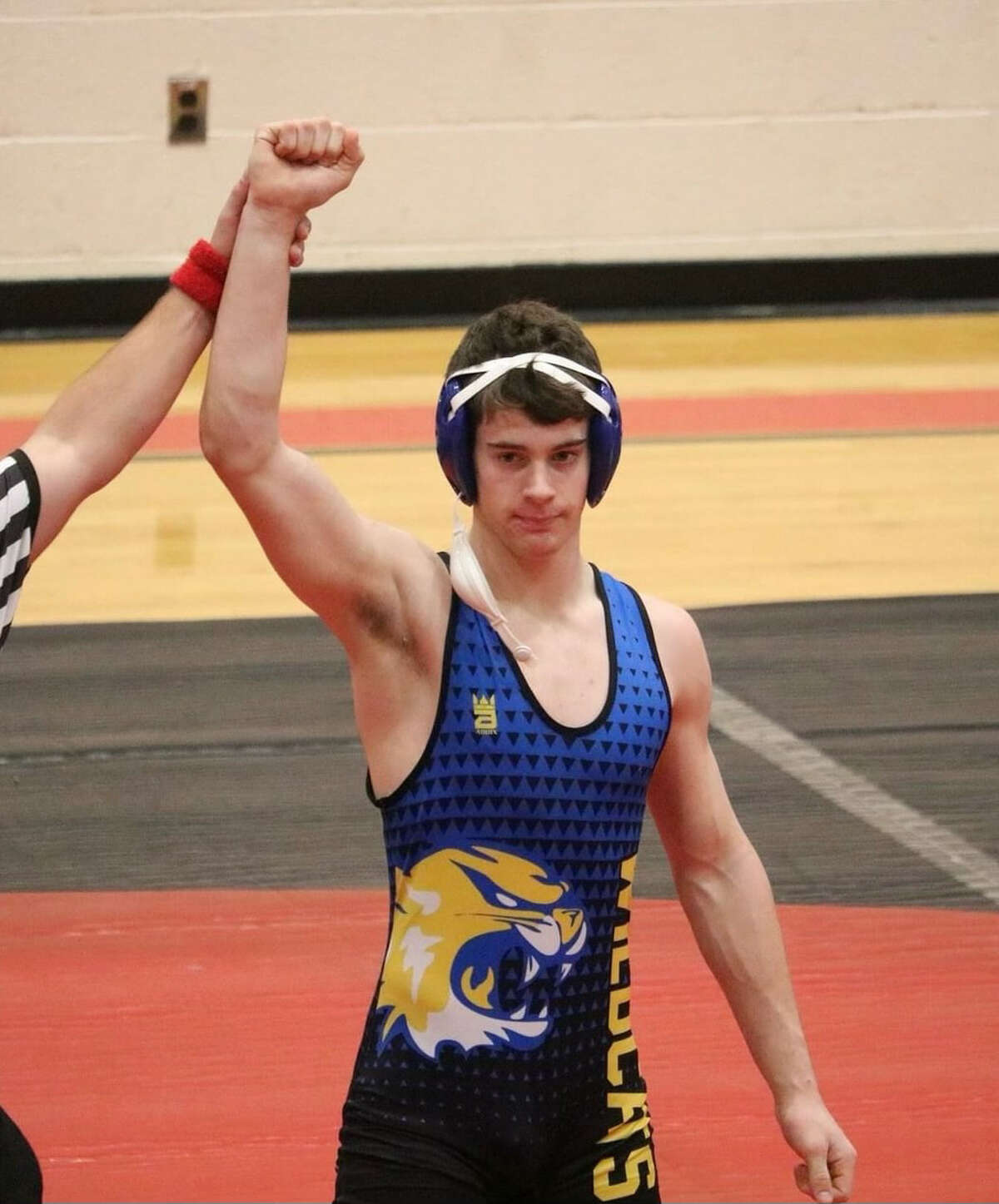 Evart's Riley Ransom competes in wrestling, football and baseball for the Wildcats.