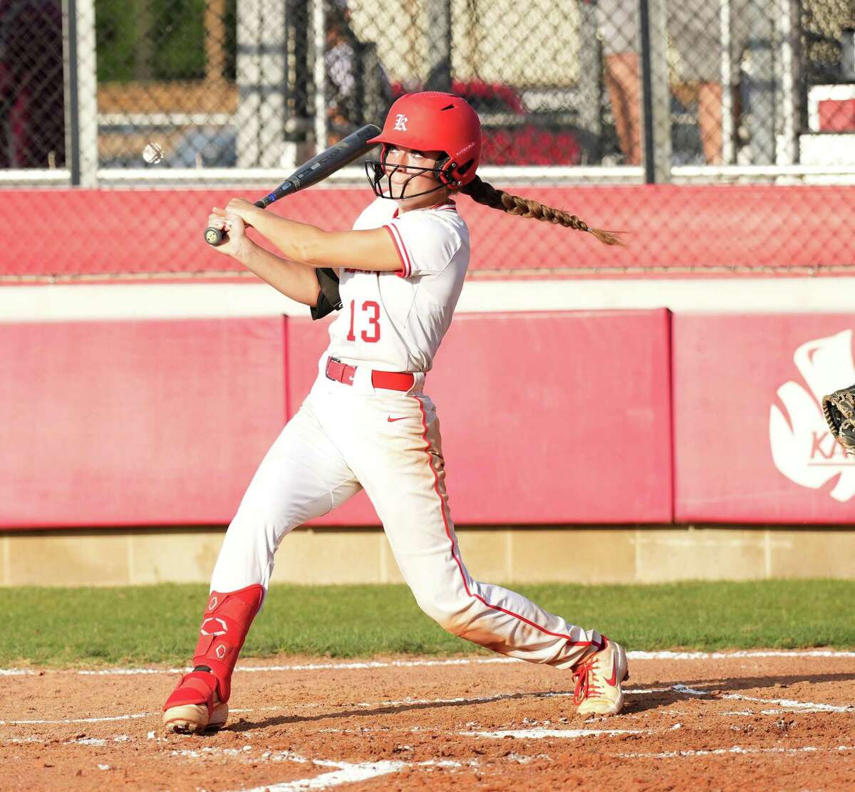 Katy’s Kailey Wyckoff (13) hits a home run in the third inning during a Region III-6A quarterfinals softball game at Katy High School on Friday, May 13, 2022 in Katy. Katy beat Cinco Ranch 10-0 in six innings.