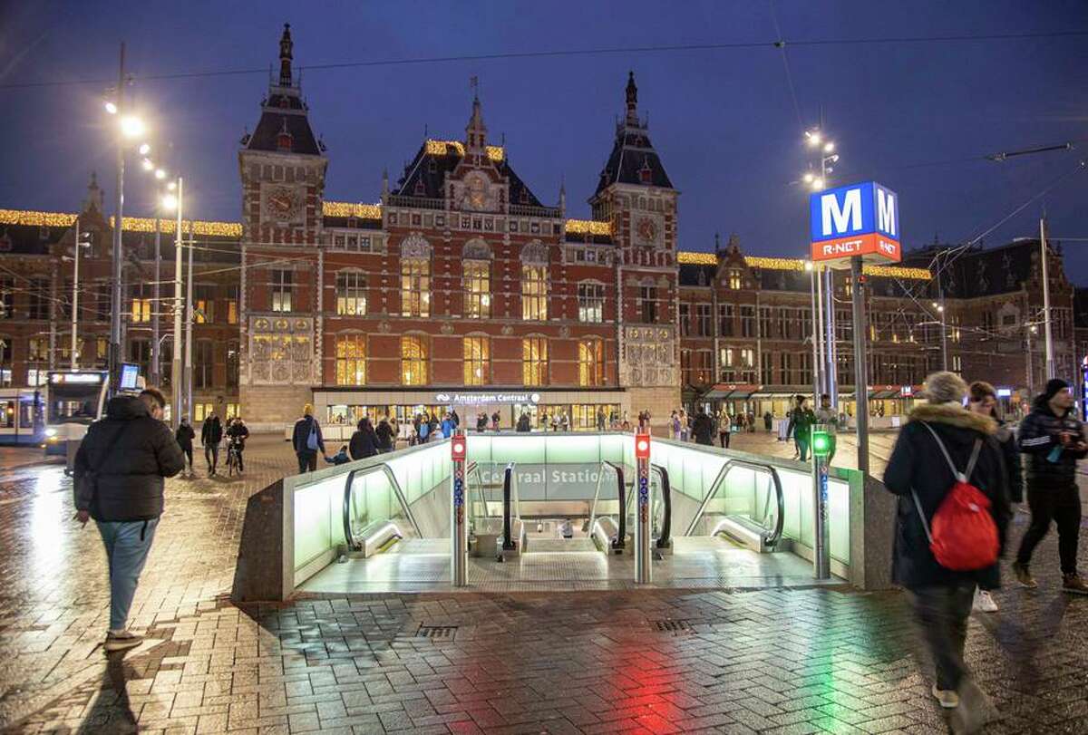 People enter the main railway station of Amsterdam, which instituted a “night mayor” in 2012 to improve city nightlife.
