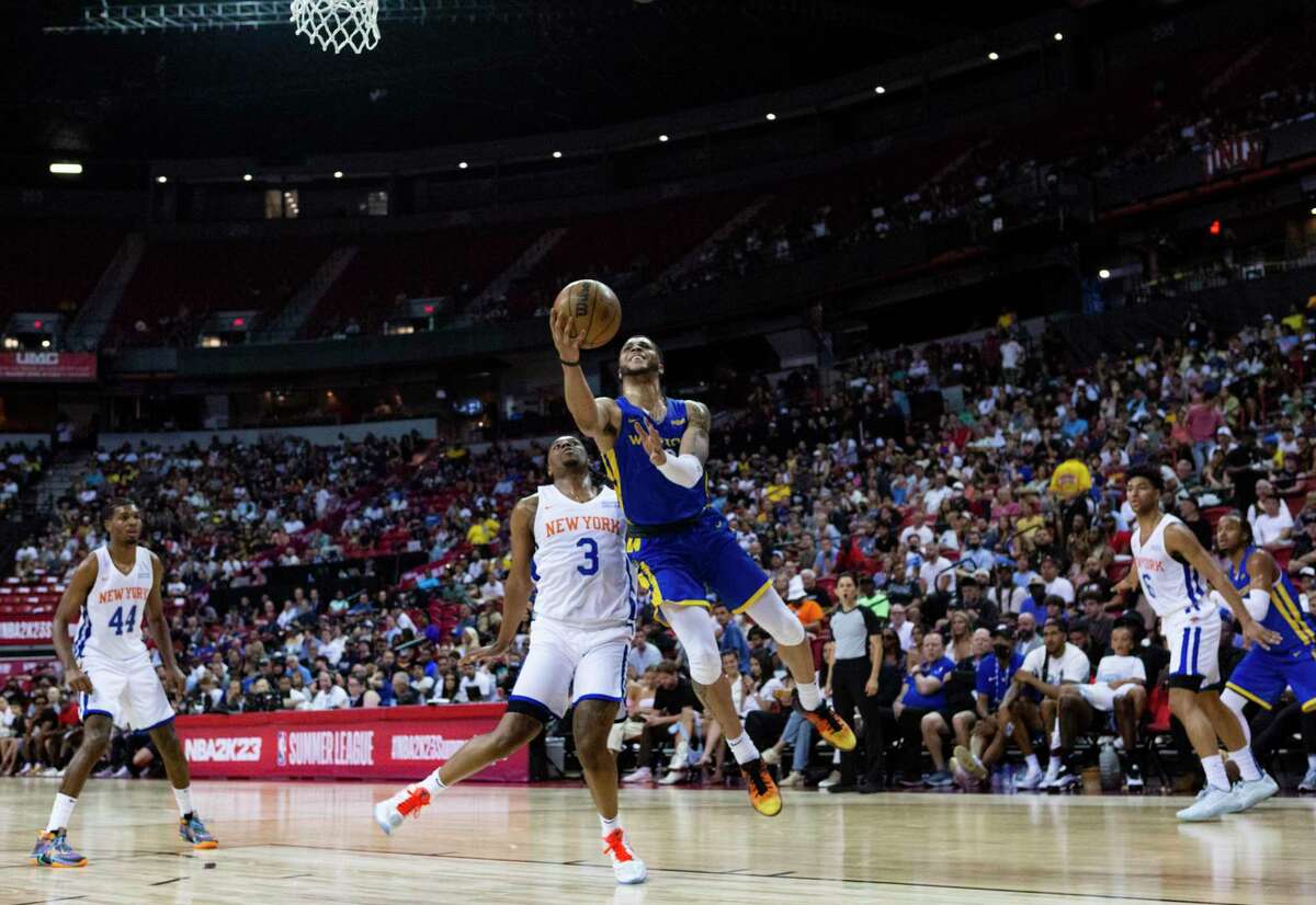 Golden State Warriors' Quinndary Weatherspoon goes to the net during a NBA 2k23 summer league basketball game against the New York Knicks Friday, July 8, 2022, in Las Vegas.