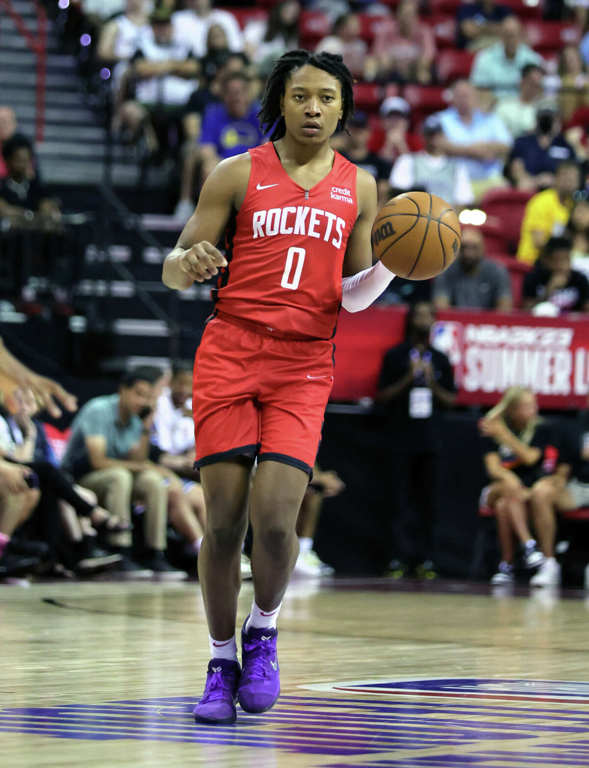 LAS VEGAS, NEVADA - JULY 11: TyTy Washington Jr. #2 of the Houston Rockets brings the ball up the court against the San Antonio Spurs during the 2022 NBA Summer League at the Thomas & Mack Center on July 11, 2022 in Las Vegas, Nevada. NOTE TO USER: User expressly acknowledges and agrees that, by downloading and or using this photograph, User is consenting to the terms and conditions of the Getty Images License Agreement. (Photo by Ethan Miller/Getty Images)