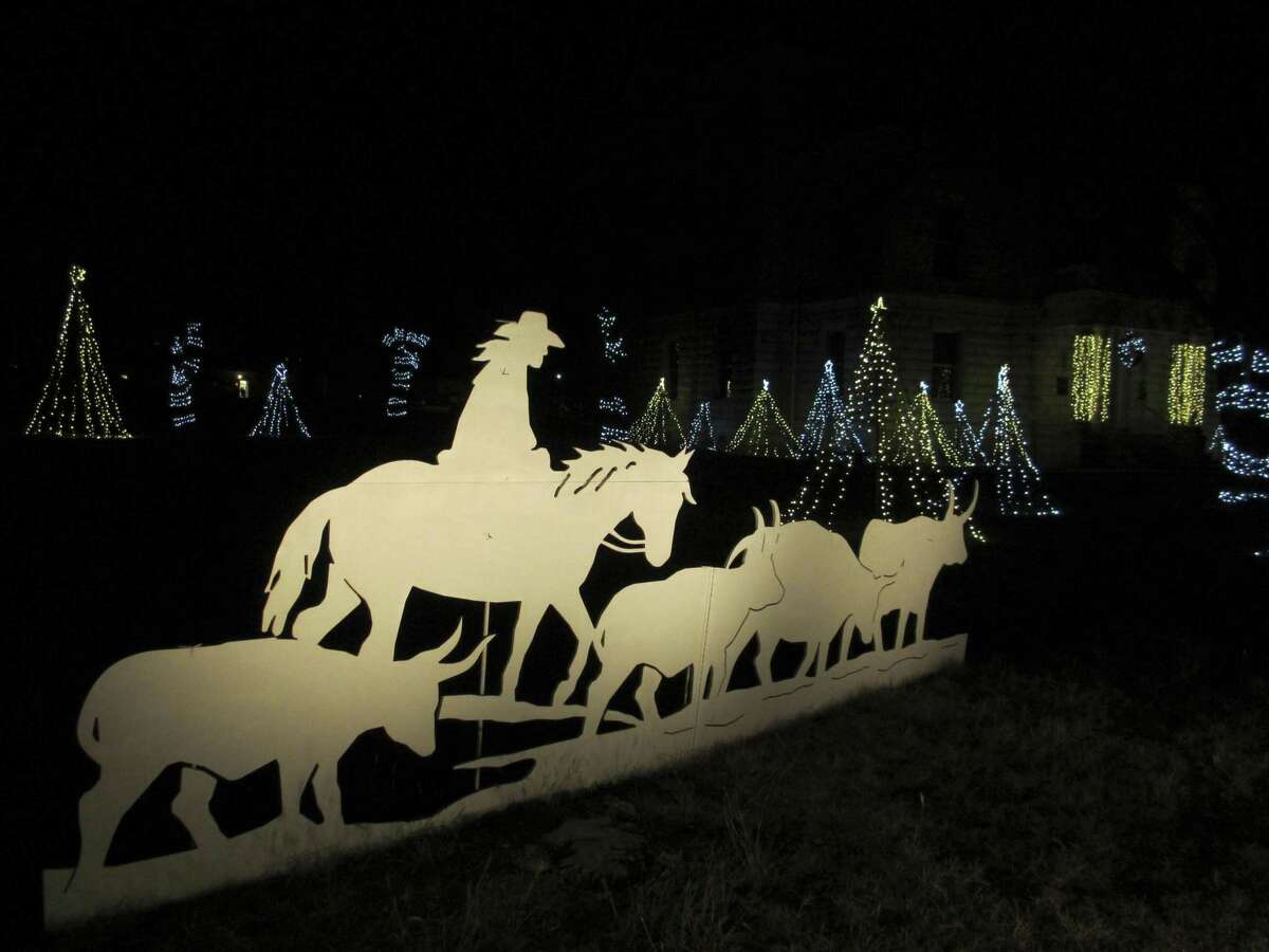 Bandera's Cowboy Capital of the World designation is reflected in its courthouse lawn holiday decorations in this file photo.