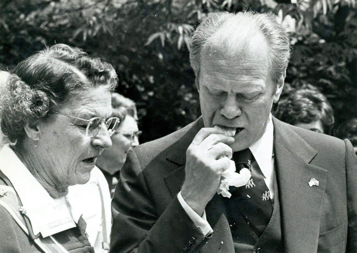 An Express-News file photo of then-President Gerald Ford eating a tamale, shuck and all on April 9,1976.