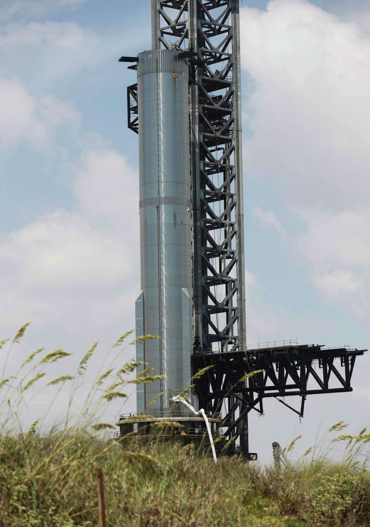 SpaceX Booster 7 on the launch pad July 1. During static testing Monday, the booster burst into flames, possibly slowing plans for a SpaceX orbital launch from South Texas.