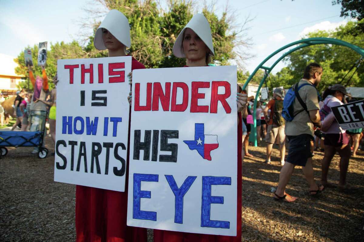 Americans aren’t facing a return to an earlier era. What’s happening now is the rise of a new patriarchal theocracy. Above, protesters attend a June 26 rally for reproductive freedom in Austin.