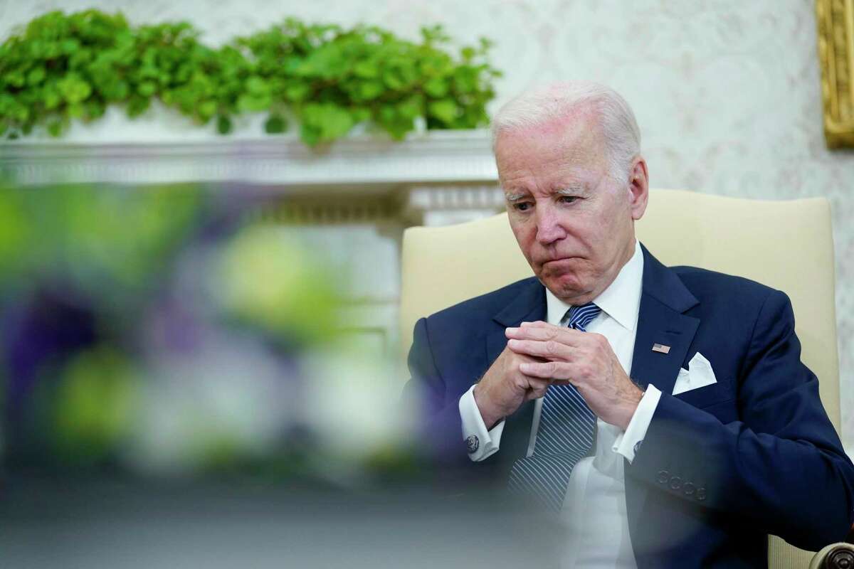 President Joe Biden listens in the Oval Office of the White House in Washington, Tuesday, July 12, 2022. (AP Photo/Susan Walsh)
