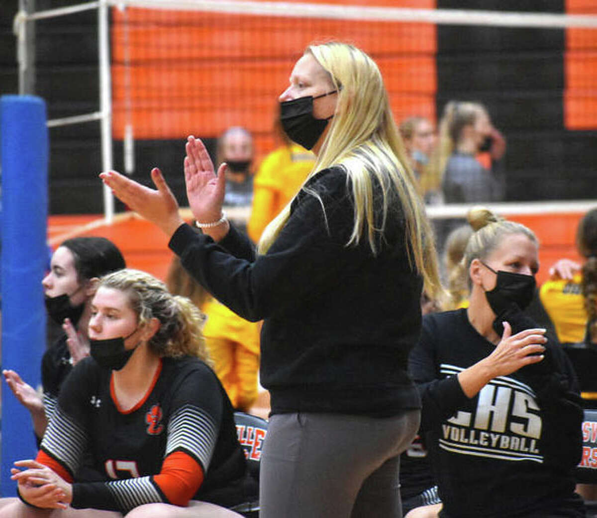 Edwardsville coach Heather Ohlau encourages her team during the Edwardsville Tournament last September. Ohlau is the 2021 Telegraph Large-Schools Girls Volleyball Coach of the Year.