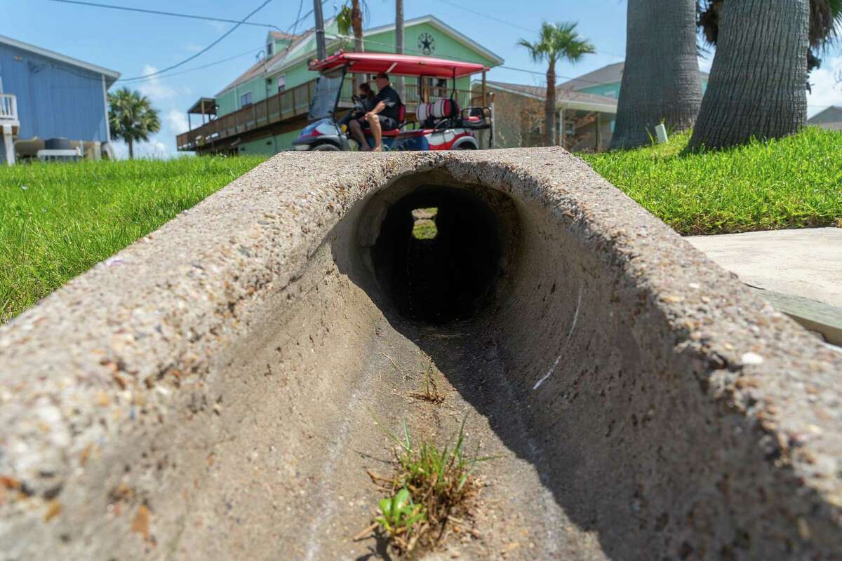 Jamaica Beach Mayor Clay Morris wants to experiment with rubber-like bladders that could be inserted into drainage pipes to prevent water from flooding streets, on May 11, 2022, in Jamaica Beach on Galveston Island.