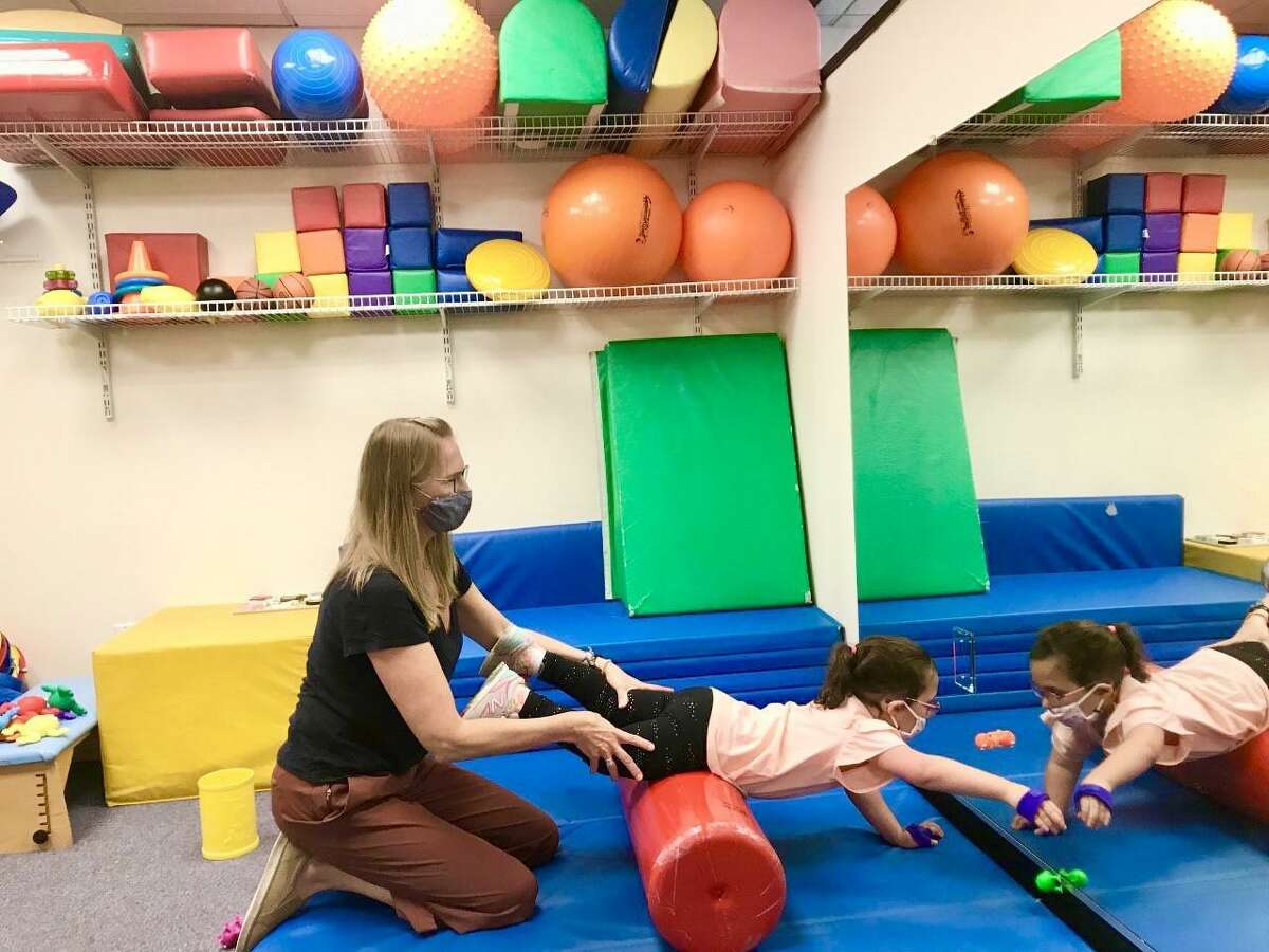 STAR Inc., Lighting the Way, a nonprofit organization, has received a grant from the New Canaan Community Foundation to support pediatric therapies for local children who have developmental disabilities. Above, physical therapist Laura Boehmer works with a local child at STAR’s Rubino Family Center.
