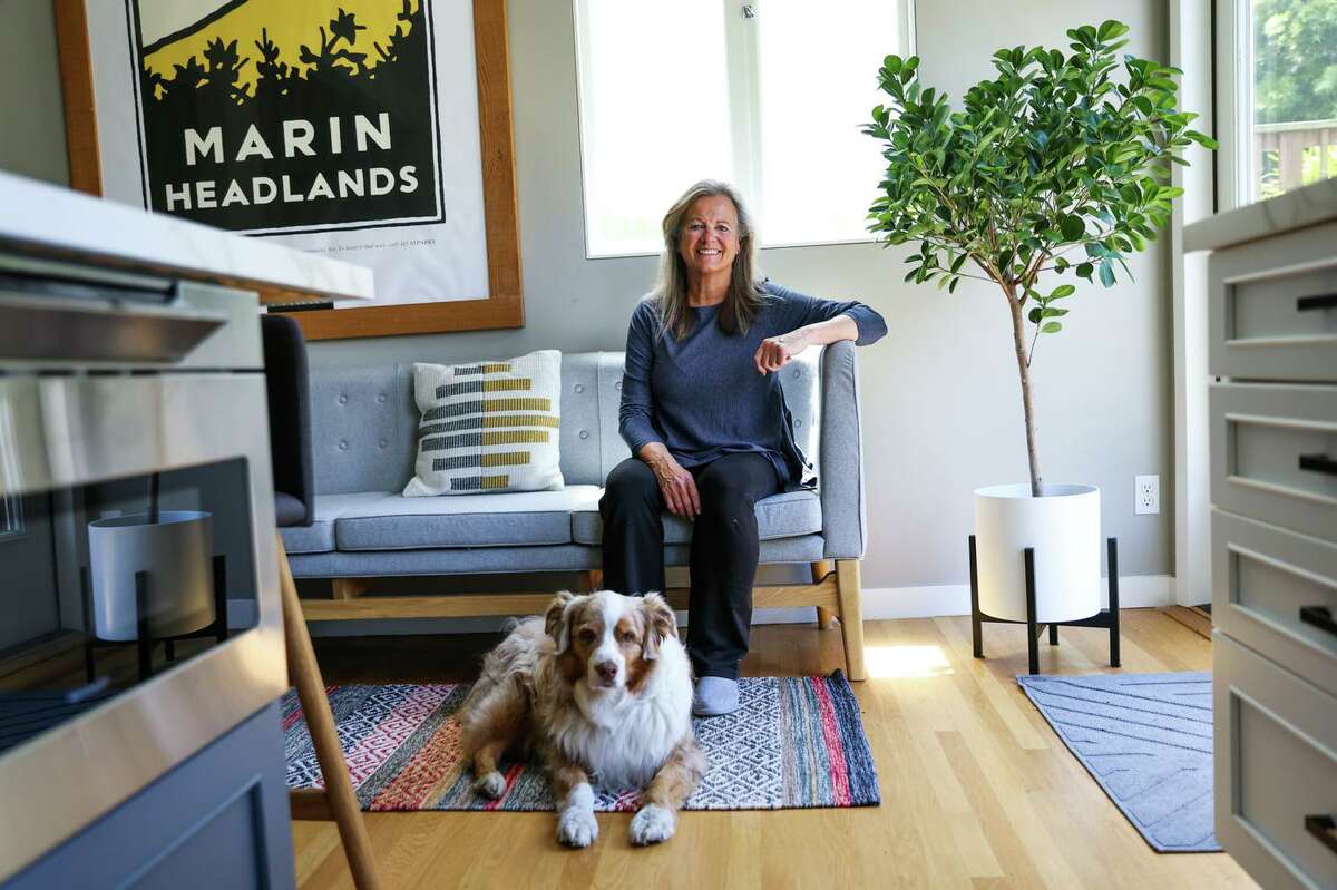 Sara McGhie, along with her dog, Boo, operates an Airbnb out of her Haight-Ashbury home.