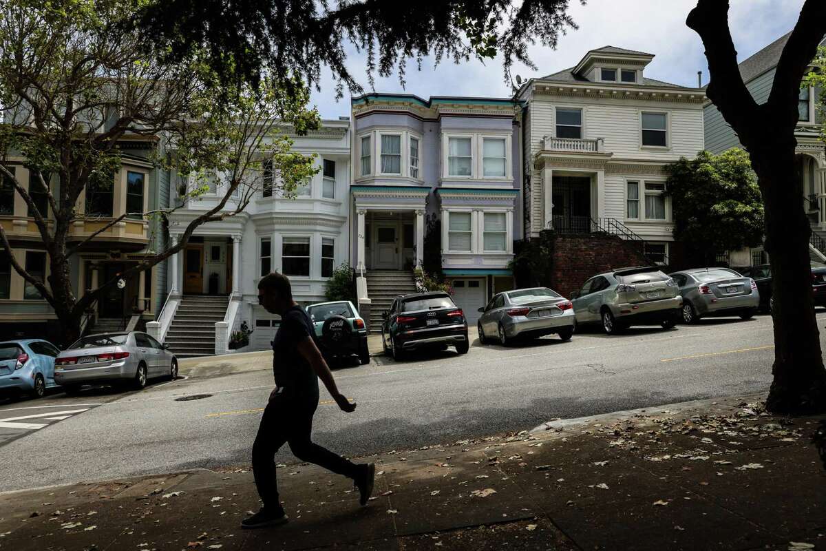 Michael Lorton and Young Choi operate an Airbnb in their Haight-Ashbury home (center).
