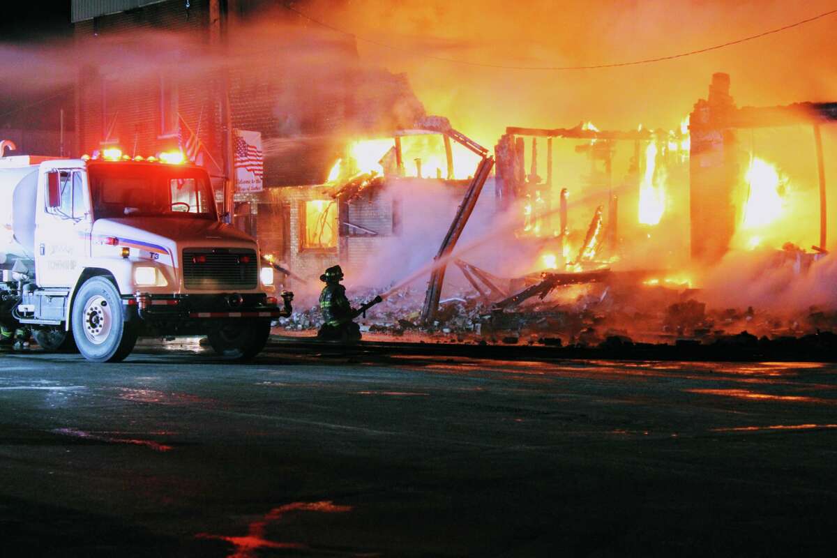 A late night fire in downtown Luther on Tuesday destroyed the historic grocery store and former hardware store.