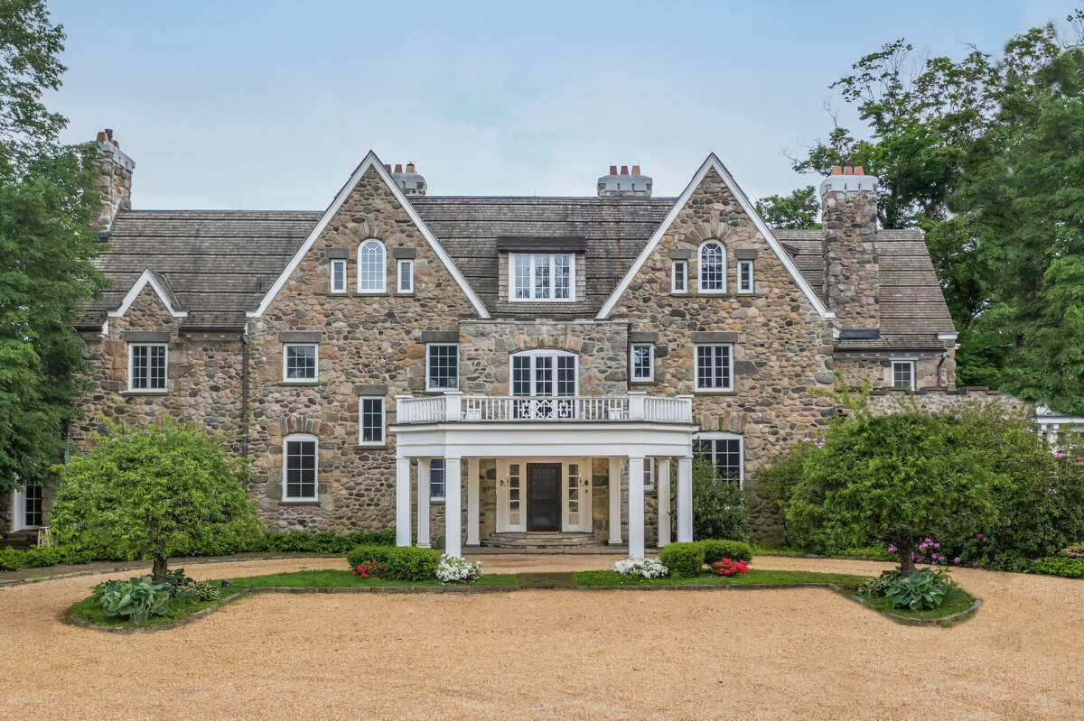 Brae Burn Farm at 15 Upper Cross Road, Greenwich, is listed for $11.997 million by Compass Connecticut’s Greenwich brokerage. The six-bedroom stone manor debuted in 1906 but has more recently been extensively renovated. Photo courtesy of Compass Connecticut.