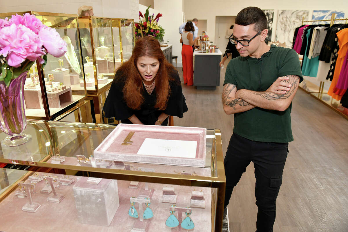Debra Messing and Christian Siriano attend as Christian Siriano celebrates the opening of THE COLLECTIVE WEST on July 12, 2022 in Westport, Connecticut.