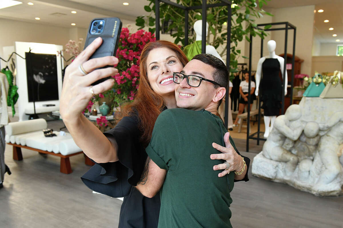Debra Messing and Christian Siriano attend as Christian Siriano celebrates the opening of THE COLLECTIVE WEST on July 12, 2022 in Westport, Connecticut. 