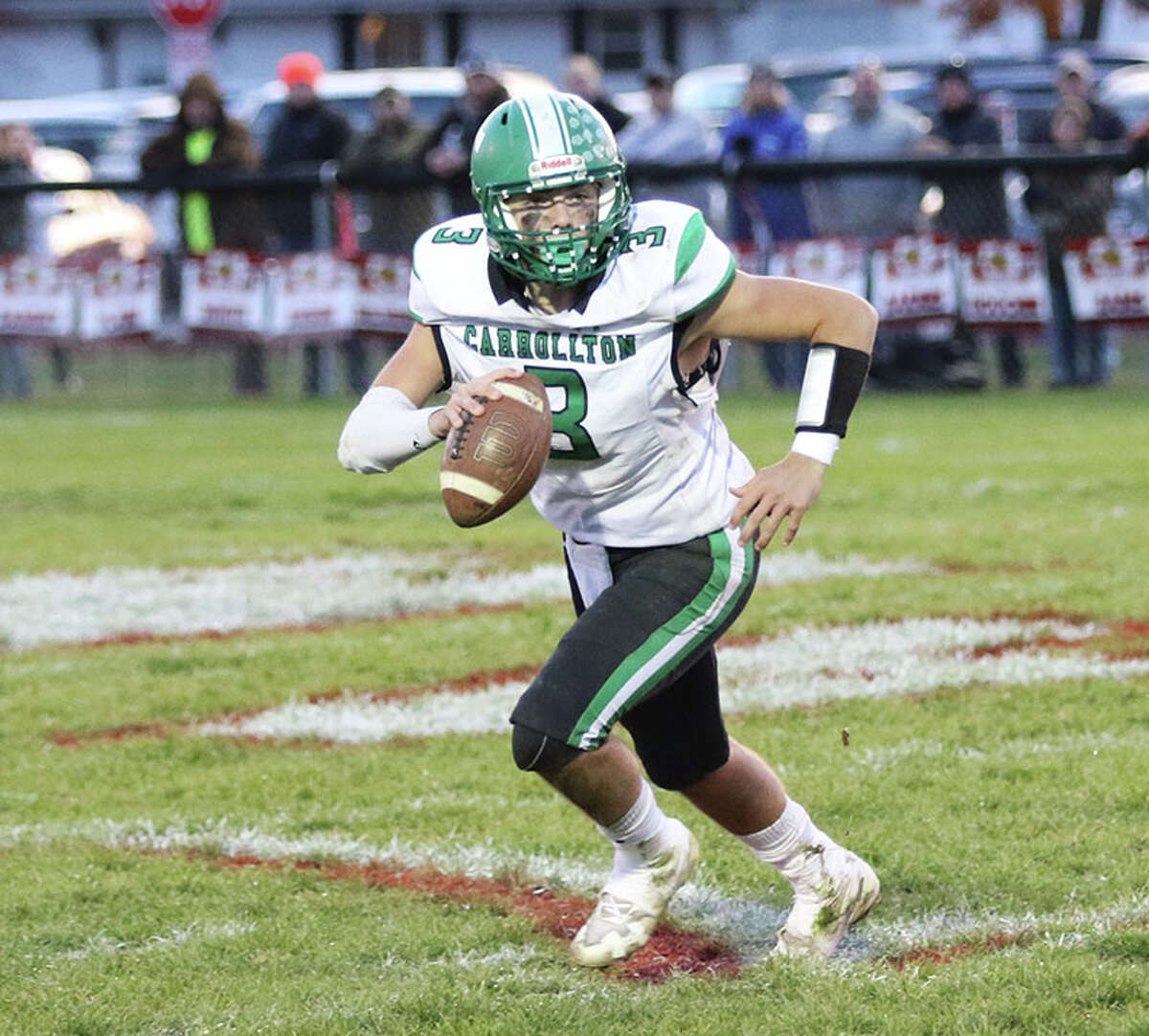 Carrollton quarterback Grant Pohlman rolls out with the football against Moweaqua Central A&M in a Class 1A semifinal last November in Moweaqua. Pohlman is the 2021 Telegraph Small-Schools Football Player of the Year.