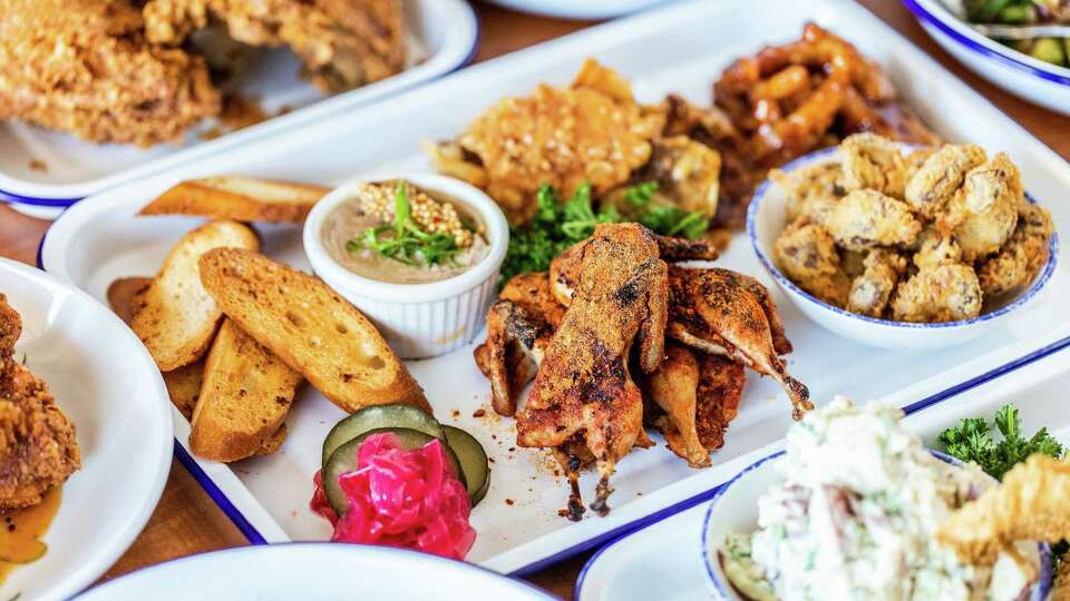 Signature board (spiced chicken cracklings, fried gizzards, glazed crispy chicken feet, smoked chicken liver pate, and spiced quail) at Gatlin's Fins & Feathers, a new restaurant from Greg Gatlin, owner of Gatlin's BBQ, that will specialize in Gulf seafood, fried chicken, and familiar Texas comfort foods opening July 15 at 302 W. Crosstimbers in the Independence Heights neighborhood.