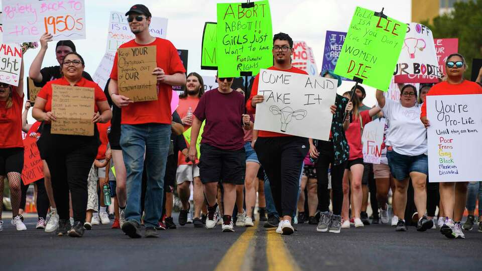 Demonstrators walk to Odessa City Hall during a march in support of reproductive rights, Saturday, July 9, 2022 in Odessa, Texas. (Eli Hartman/Odessa American via AP)