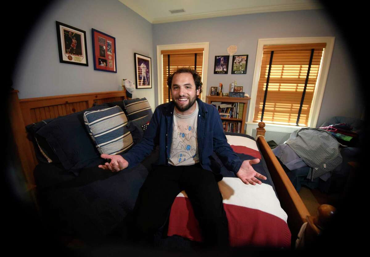 Comedian Joey Rinaldi chats in his childhood bedroom in the Glenville section of Greenwich, Conn. Monday, July 11, 2022. Rinaldi is presenting a one man comedy show called "Potty Training" at 59E59 Theaters in New York on July 12, 15, and 16.