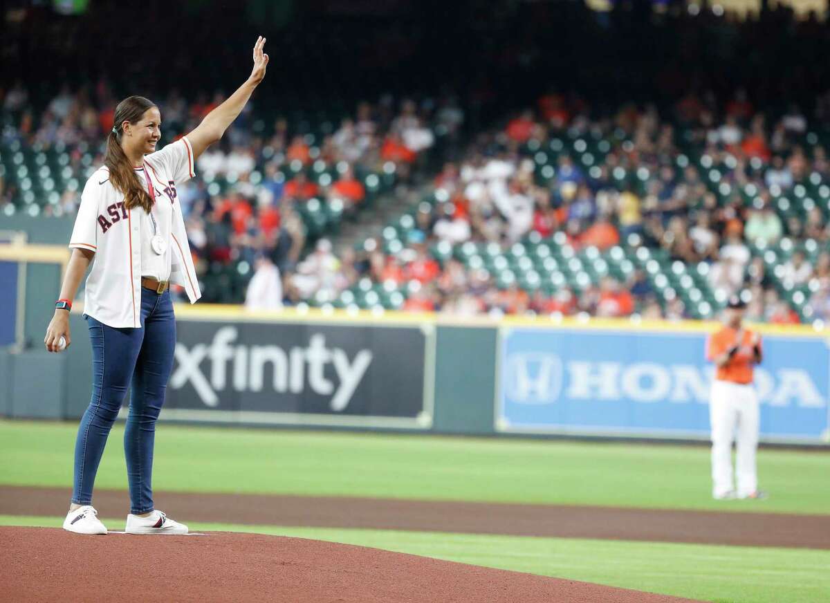 Osterman waves to the crowd before throwing the first pitch during a Houston Astros game on August 6, 2021.