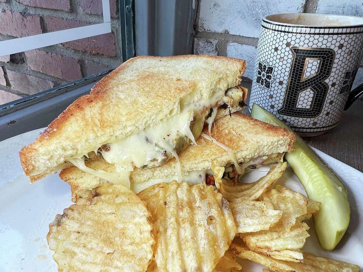 Spinach and artichoke grilled cheese on brioche bun is one of the sandwich options at Bird Bakery in Alamo Heights.