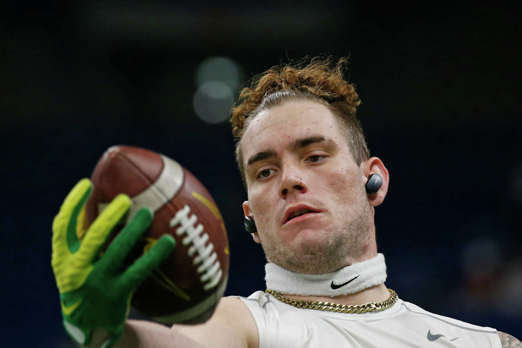 rock climbing football player