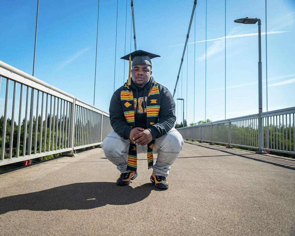 Brandon Bailey on the Guy West Bridge at California State University Sacramento shortly before his graduation.