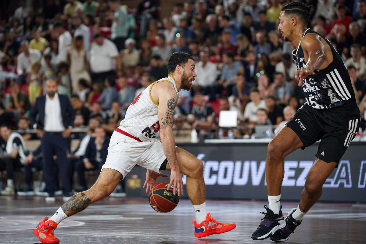 Former Lamar player Mike James crosses over his defender during a EuroLeague game. James has re-signed with A.S. Monaco. 