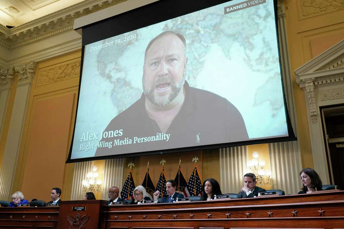 A video showing Alex Jones is shown as the House select committee investigating the Jan. 6 attack holds a hearing at the Capitol in Washington on Tuesday.