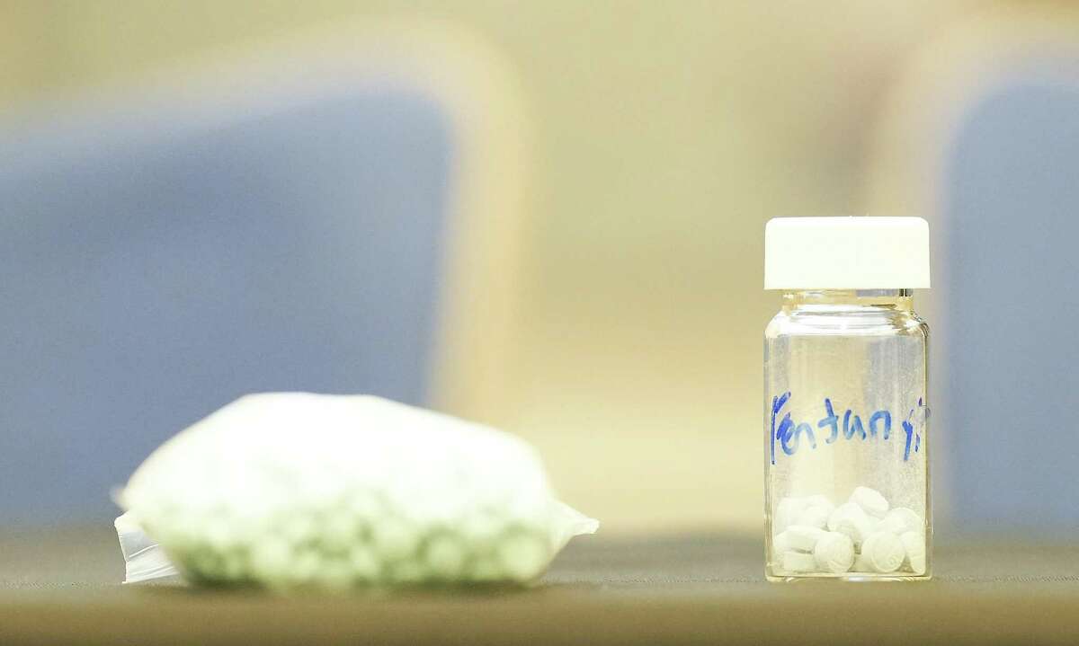 Drugs laced with fentanyl sit on a table before a press conference with Texas Gov. Greg Abbott on Thursday, July 14, 2022 in Houston.