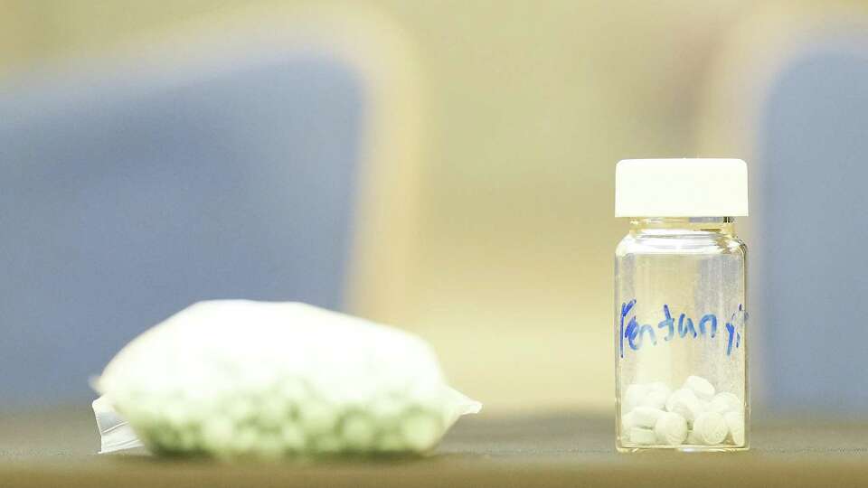 Drugs laced with fentanyl sit on a table before a press conference with Texas Gov. Greg Abbott on Thursday, July 14, 2022 in Houston.