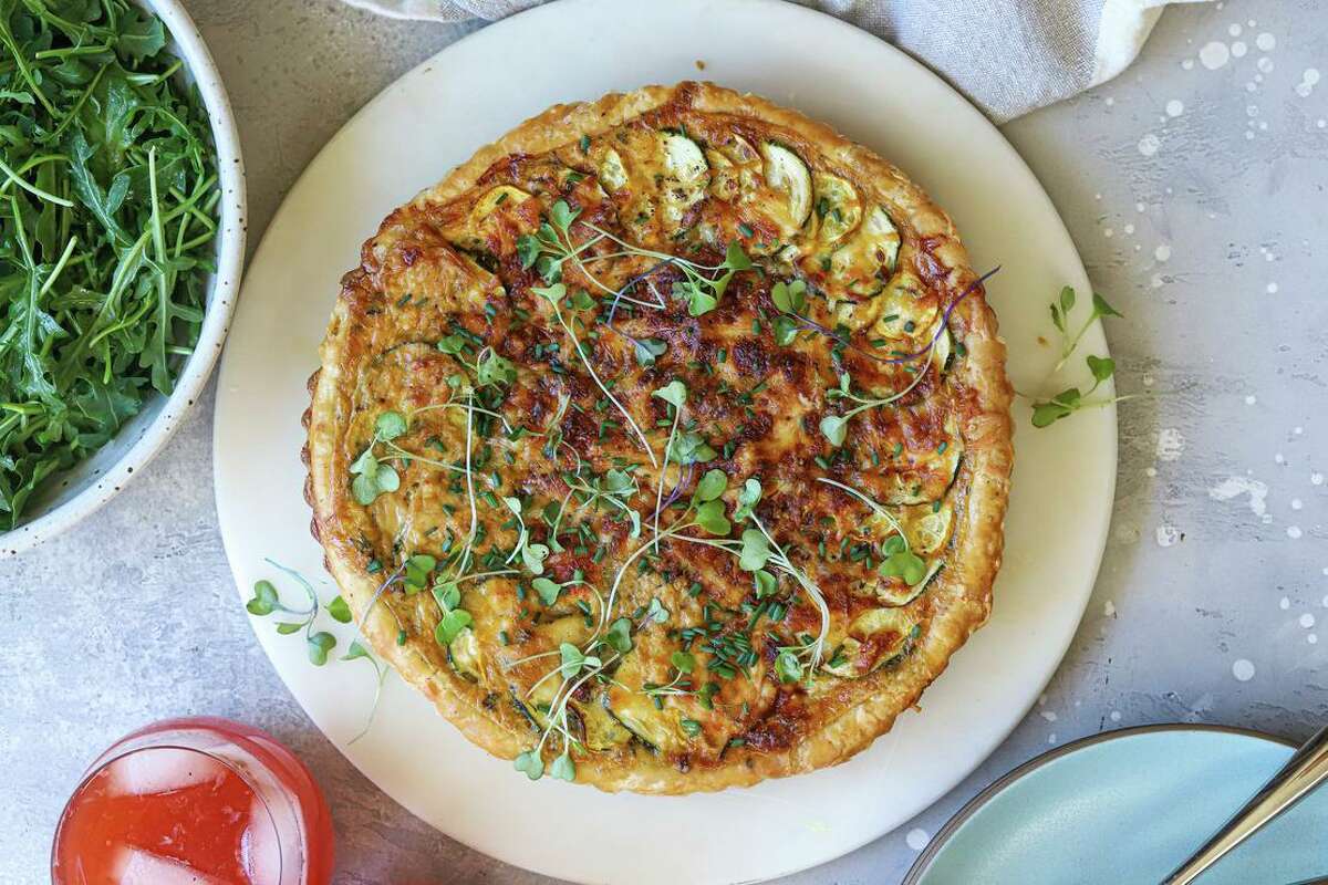 Zucchini, Summer Squash & Corn Tart pairs farmers’ market produce with a flaky crust and cheese.