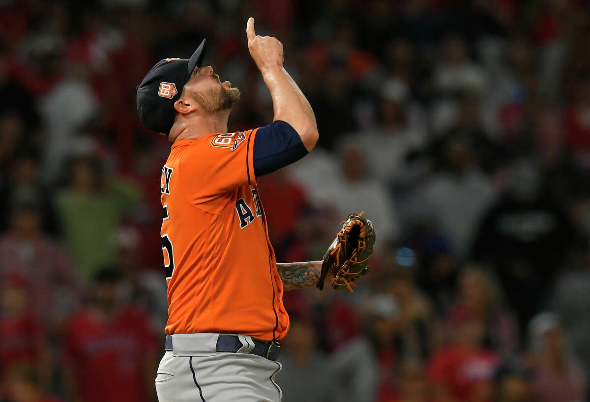 ANAHEIM, CA - JULY 14: Ryan Pressly #55 of the Houston Astros celebrates striking out Brandon Marsh of the Los Angeles Angels for the final out in a 3-2 win in 10 innings at Angel Stadium of Anaheim on July 14, 2022 in Anaheim, California. (Photo by John McCoy/Getty Images)