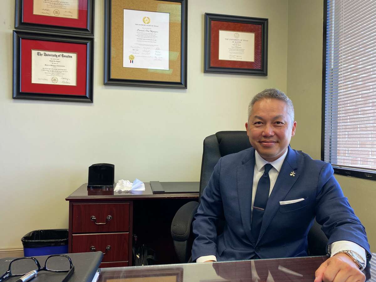 Doanh Zone Nguyen sits at his office after being appointed permanent city attorney in June.