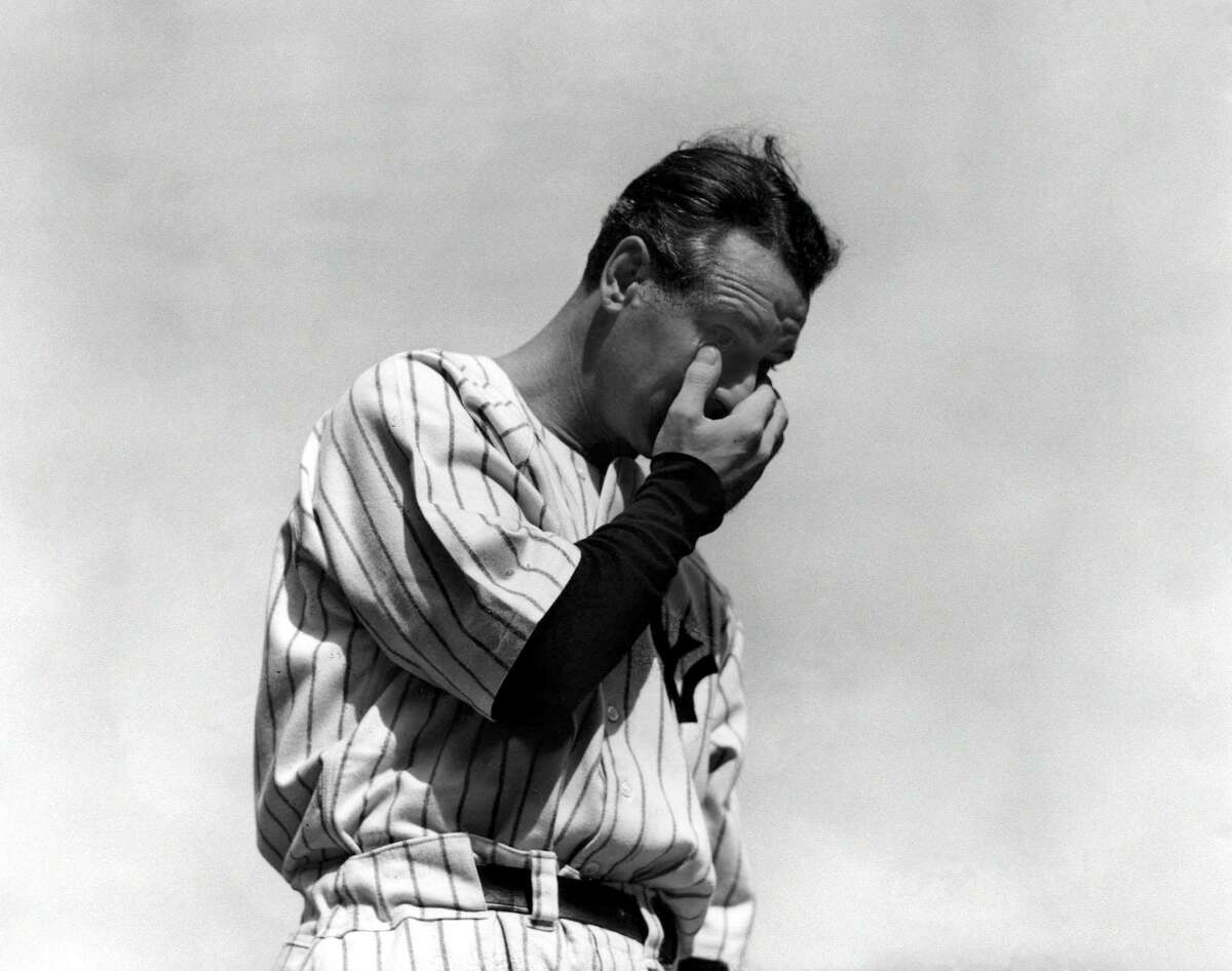 New York Yankees Lou Gehrig, the “Iron Horse,” wipes away a tear during a sold-out tribute at Yankee Stadium July 4, 1939.