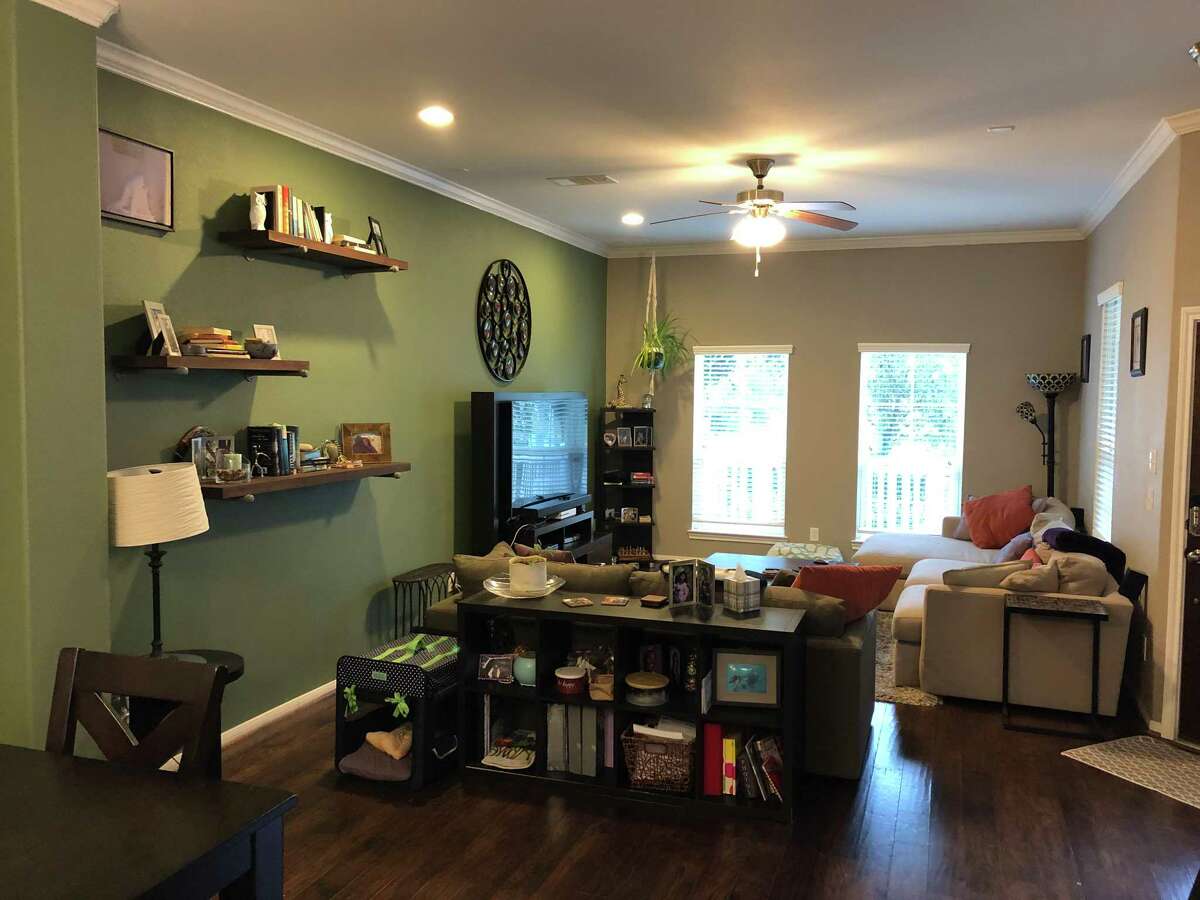 Before: The plain, builder-grade living room felt dark and drab.