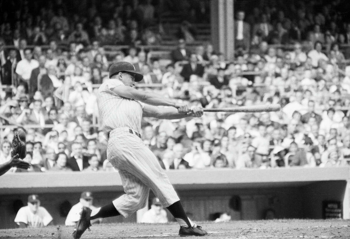 Yankee Stadium, Bronx, NY, October 1, 1961 – Roger Maris takes curtain call  after breaking Ruth's home run record