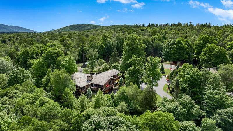 Michele Riggi husband list Lake Placid compound for 31 million