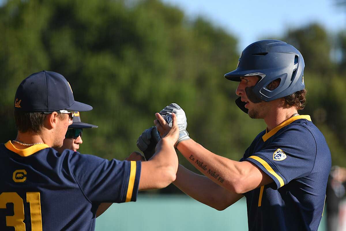 Cal's Dylan Beavers (right) hit 35 home runs over the past two seasons.
